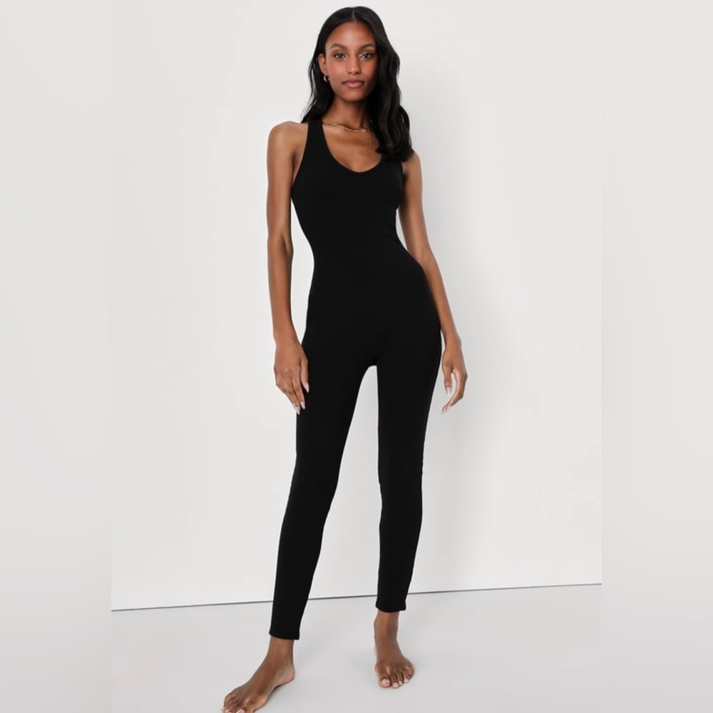 NWT “Relaxing Reality” Black ribbed knit cross-back jumpsuit